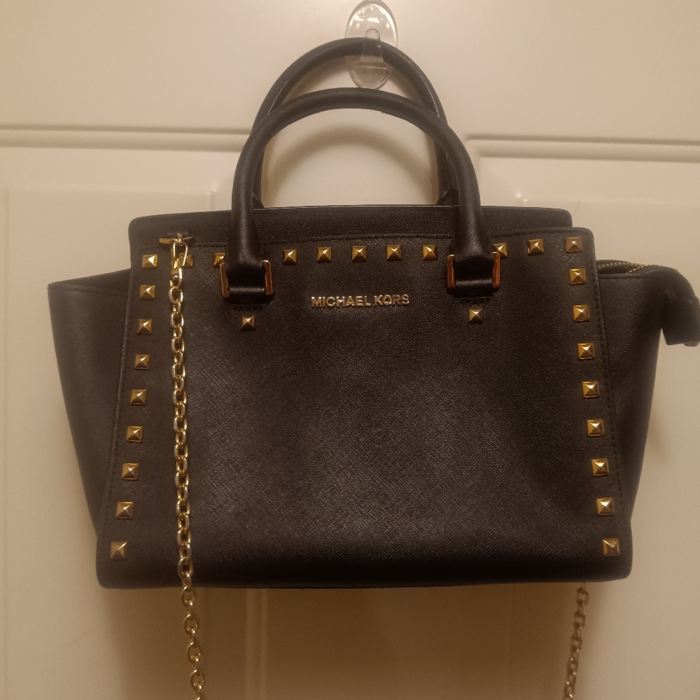Michael Kors medium studded Selma satchel bag in black saffiano leather.